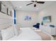 Bright bedroom featuring stylish chair, ample dresser storage, and a calming color palette at 341 Burma St, Kissimmee, FL 34747