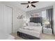 Comfortable bedroom featuring a large bed, stylish decor, and soft, neutral color scheme at 341 Burma St, Kissimmee, FL 34747
