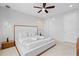 Serene bedroom featuring a plush bed, modern lighting, and stylish decor, offering a relaxing retreat at 341 Burma St, Kissimmee, FL 34747