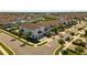 A charming two-story home boasting a well-manicured lawn in a desirable neighborhood at 341 Burma St, Kissimmee, FL 34747