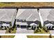 New home with landscaped yard, a brick driveway, and a gray tile roof at 3860 Sonoma Blvd, Kissimmee, FL 34741