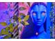 Up-close Avatar themed decor on beds with vines and custom lighting adding to the immersive experience at 3860 Sonoma Blvd, Kissimmee, FL 34741