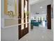 Bright entryway featuring sleek white marble floors, modern decor, and an open floor plan at 3860 Sonoma Blvd, Kissimmee, FL 34741