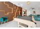 Entertaining game room with pool table, custom wall decor, and comfortable seating creates a fun atmosphere at 3860 Sonoma Blvd, Kissimmee, FL 34741