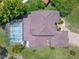 Aerial image showing home, private pool, and a well-manicured lawn at 4019 Lake Mirage Blvd, Orlando, FL 32817