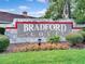 Attractive community sign for Bradford Cove featuring meticulous landscaping at 4019 Lake Mirage Blvd, Orlando, FL 32817