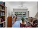 Inviting living room area with a view of the pool, a ceiling fan, and comfortable seating for relaxing at 4019 Lake Mirage Blvd, Orlando, FL 32817