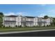 Row of modern townhomes with gray and white siding and manicured lawns at 4568 Maple Waltz Aly, Clermont, FL 34714