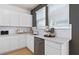 Bright kitchen with white countertops, stainless steel dishwasher, and stylish tile backsplash at 4568 Maple Waltz Aly, Clermont, FL 34714