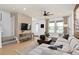 Modern living room with contemporary sofa and stylish decorations at 4568 Maple Waltz Aly, Clermont, FL 34714