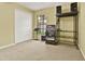 Bedroom with neutral carpet, a window, and closet, ideal for music enthusiasts, shown with speakers and equipment at 4571 Abaco Dr, Tavares, FL 32778