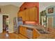 Functional kitchen design with stainless steel appliances and granite countertops, storage and space at 4571 Abaco Dr, Tavares, FL 32778