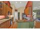 Well-equipped kitchen features granite countertops, stainless steel appliances, and ample cabinet space at 4571 Abaco Dr, Tavares, FL 32778