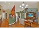 Open floor plan with living room, breakfast nook, and access to other living spaces at 4571 Abaco Dr, Tavares, FL 32778