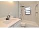 Modern bathroom with new vanity, tiled shower/tub, contemporary fixtures, and ample storage at 5805 Hutton Dr, Orlando, FL 32808