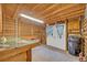 Interior of horse stable including a workspace with wood finishes at 595 Seminole Woods Blvd, Geneva, FL 32732