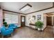 Open living area with tile flooring, natural light, and stylish decor at 6 S Lakewood Dr, Orlando, FL 32803