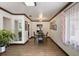 Bright, open-concept living and dining area featuring tile floors and neutral walls at 6 S Lakewood Dr, Orlando, FL 32803