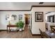 Living room featuring tile flooring, neutral paint, and open access to the kitchen at 6 S Lakewood Dr, Orlando, FL 32803