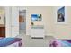 A view of a bedroom with light colored walls and Frozen themed decor at 640 Lasso Dr, Kissimmee, FL 34747