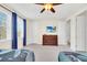 Spacious bedroom featuring two beds, and natural light at 640 Lasso Dr, Kissimmee, FL 34747