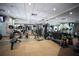 Community gym featuring various weight machines, treadmills, free weights and TVs at 640 Lasso Dr, Kissimmee, FL 34747