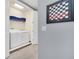 Bright laundry room with a washer and dryer, and a checkers art piece at 640 Lasso Dr, Kissimmee, FL 34747