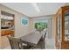 Bright dining area with sliding doors leading to an outdoor patio at 750 W May St, Deland, FL 32720