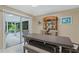 Dining room featuring a large table and sliding glass door to the porch at 750 W May St, Deland, FL 32720