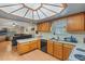 Open kitchen design with modern appliances seamlessly flows into the living space at 750 W May St, Deland, FL 32720