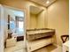 Bathroom with granite countertops and vanity with storage at 7667 Recife Dr, Kissimmee, FL 34747
