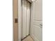 The elevator door is open to a room at 7667 Recife Dr, Kissimmee, FL 34747