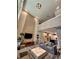 Dramatic living room showcasing high ceilings, modern lighting, and an open floor plan at 7667 Recife Dr, Kissimmee, FL 34747