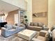 Comfortable living room with neutral tones, stylish decor, and plenty of seating at 7667 Recife Dr, Kissimmee, FL 34747