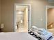 Spacious main bedroom shows ensuite bathroom with a glass enclosed walk-in shower at 7667 Recife Dr, Kissimmee, FL 34747