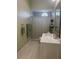 Bathroom featuring a vanity with a white countertop, neutral walls and a shower with a curved shower rod at 802 Kaywood Dr, Orlando, FL 32825