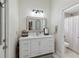 This bathroom features a large vanity and marble accents in the shower room at 802 Kaywood Dr, Orlando, FL 32825