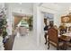 Spacious hallway with views of a living room and dining room, and tile floors at 802 Kaywood Dr, Orlando, FL 32825