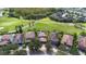 Aerial view of the neighborhood showcases the mature trees, landscaping, and community layout at 8312 Prestbury Dr, Orlando, FL 32832
