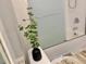 Close up of a well decorated bathroom highlighting plant accents at 944 Park Terrace Cir, Kissimmee, FL 34746
