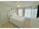 Serene bedroom with a queen-sized bed, sheer curtains, and soft, inviting decor at 944 Park Terrace Cir, Kissimmee, FL 34746