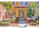 Charming yellow two-story home with well-maintained landscaping and a welcoming front entrance at 944 Park Terrace Cir, Kissimmee, FL 34746