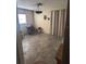 Dining area featuring tile flooring, natural lighting, and ample space, awaiting personalization at 977 E Normandy Blvd, Deltona, FL 32725