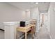 Functional upstairs hallway with a work desk, chair and easy access to other rooms at 10172 Hadley St, Orlando, FL 32829