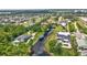 Aerial view of the neighborhood with lake views and luxurious backyard water access at 10352 Burris Ct, Orlando, FL 32836