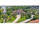 Aerial view of the neighborhood with lake views, lush landscaping, and beautiful homes at 10352 Burris Ct, Orlando, FL 32836