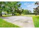 A view of the basketball court area in the backyard, perfect for recreation and sports at 10352 Burris Ct, Orlando, FL 32836