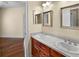 Bathroom with double sinks and vanity at 10352 Burris Ct, Orlando, FL 32836