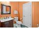 Comfortable bathroom with custom vanity and updated fixtures at 10352 Burris Ct, Orlando, FL 32836