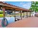 Private boat dock with a boat lift, offering direct access to the lake at 10352 Burris Ct, Orlando, FL 32836